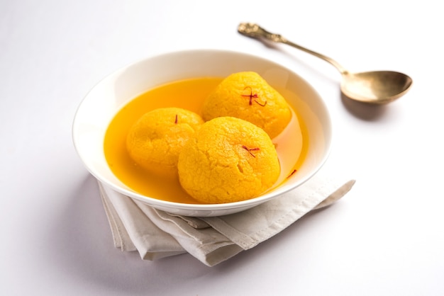 Rajbhog is a traditional Bengali sweet dish made using  paneer or chena and flavoured with saffron and rose essence