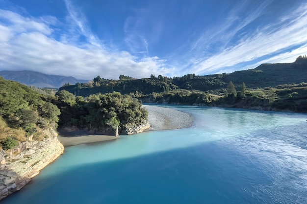 The Rakaia river runs through the gorge lined by high cliffs