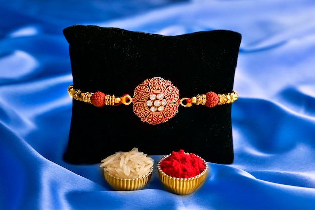 Photo raksha bandhan rakhi with roli and chawal