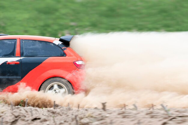 Rally car in dirt track