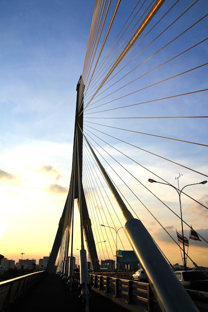 The Rama VIII bridge over the Chao Praya river at sunset in Bangkok