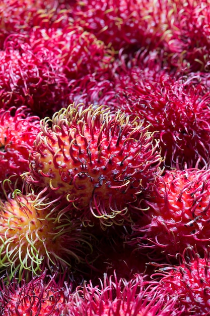 Rambutan stack closeup at market stall