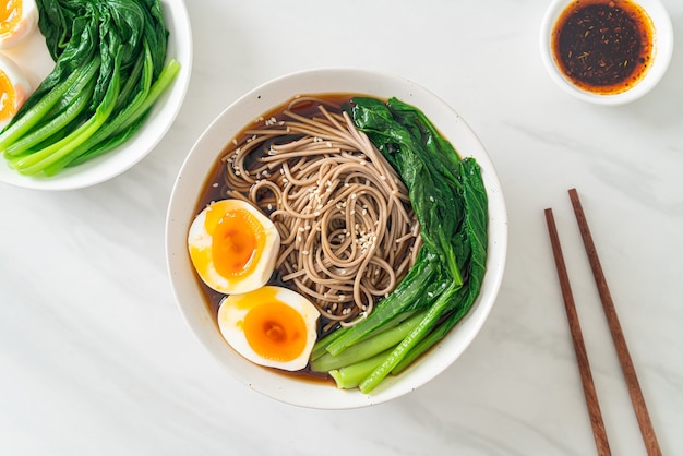 ramen noodles with egg and vegetable - vegan or vegetarian food style