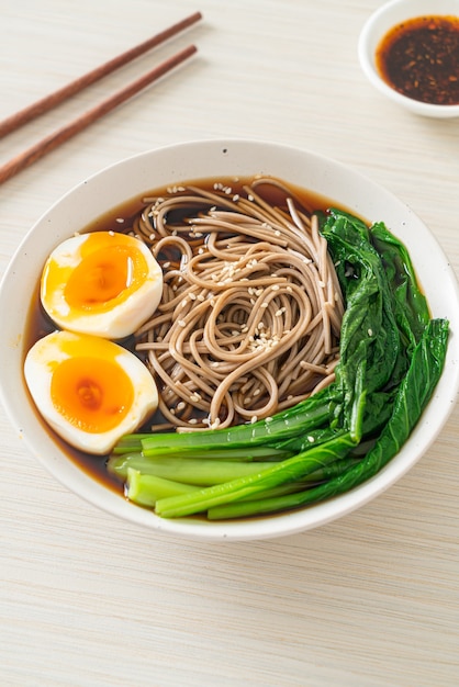 ramen noodles with egg and vegetable - vegan or vegetarian food style