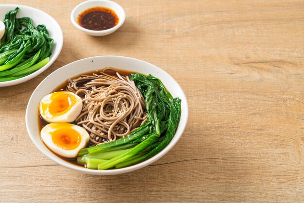 ramen noodles with egg and vegetable - vegan or vegetarian food style