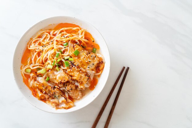 ramen noodles with gyoza or pork dumplings