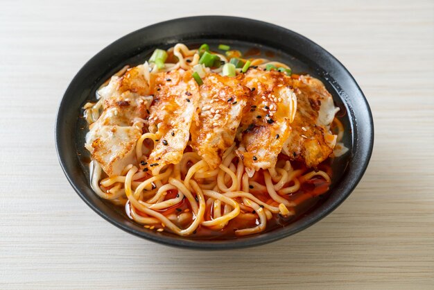 Photo ramen noodles with gyoza or pork dumplings