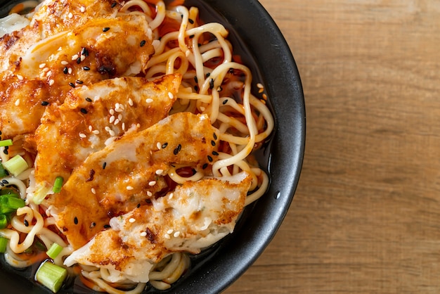 ramen noodles with gyoza or pork dumplings