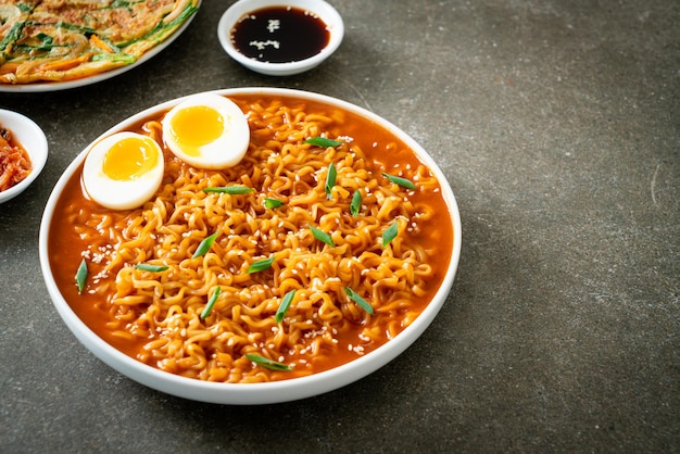 Ramyeon or Korean instant noodles with egg - Korean food style