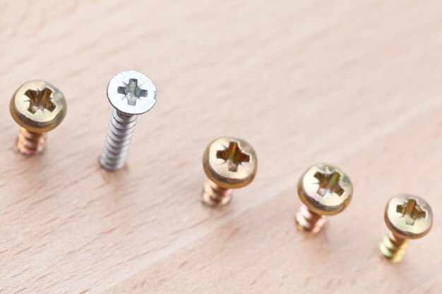 Range of screws wrapped in wooden plank