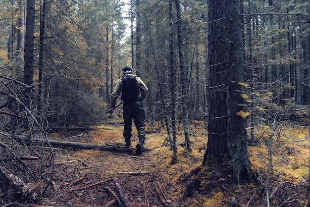 ranger in autumn forest forester guide