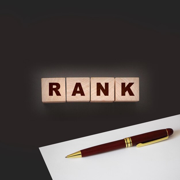 RANK text on a black background on wooden cubes Ranking SEO concept