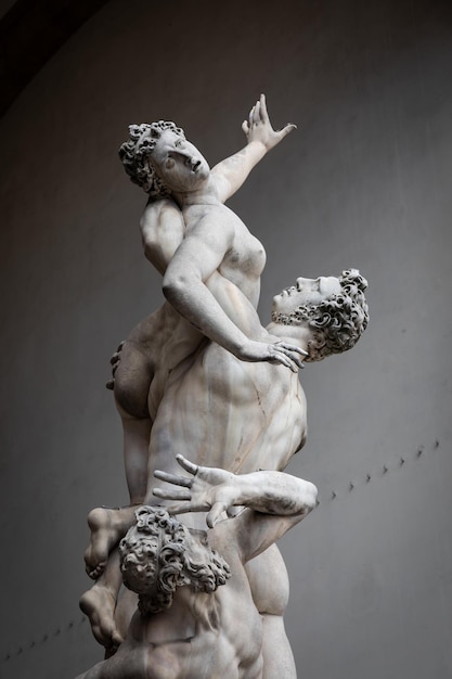 Photo the rape of proserpina renaissance statue by giambologna florence italy