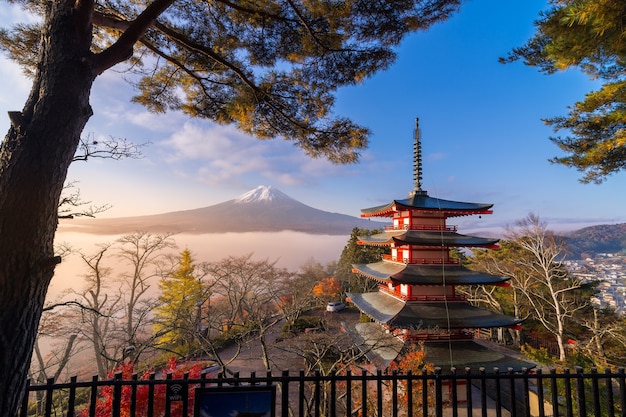 Rare scene of Chureito pagoda and Mount Fuji with morning fog, Japan in autumn