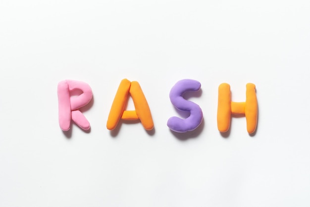 Rash word formed of colored plasticine
