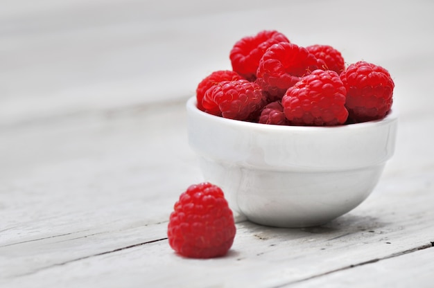 Raspberries on little bowl