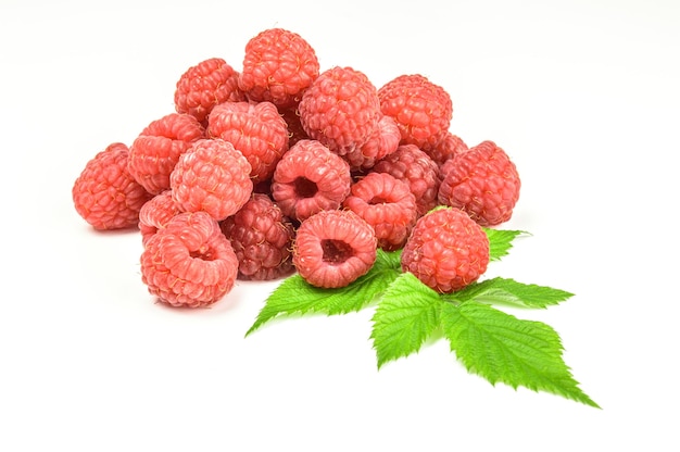 Raspberries with leaves isolated on white