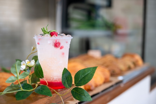 Raspberry Italian soda ready to serve for refreshing on counter bar in cafe. use for decorated cafe, restaurant and et cetera.