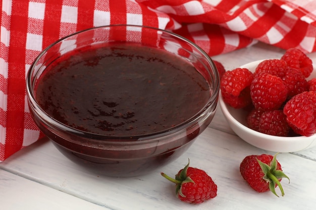 Raspberry jam in a glass vessel