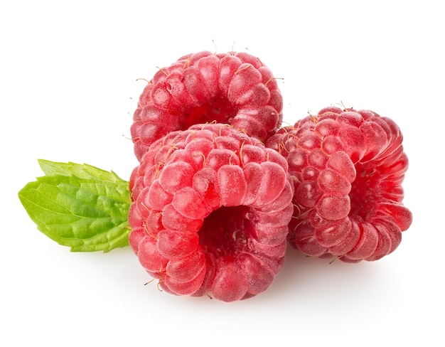 Raspberry with green leaf isolated on white