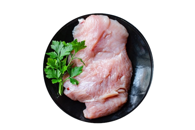 Rauw vlees of kip van kalkoenfilet klaar om te koken en te eten