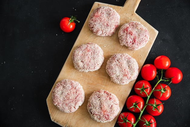 rauwe kotelet vlees verse koteletten gezonde maaltijd voedsel snack op tafel kopieer ruimte voedsel achtergrond