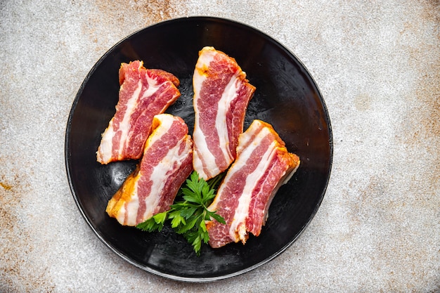 Rauwe ribben vers vlees varkensvlees kruid paprika maaltijd snack op tafel kopieer ruimte voedsel achtergrond rustiek