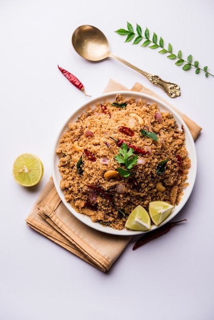 Rava Upma or Uppuma - south indian breakfast served in a bowl. selective focus