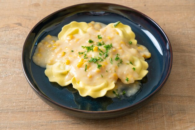 Ravioli pasta with corn cheese sauce