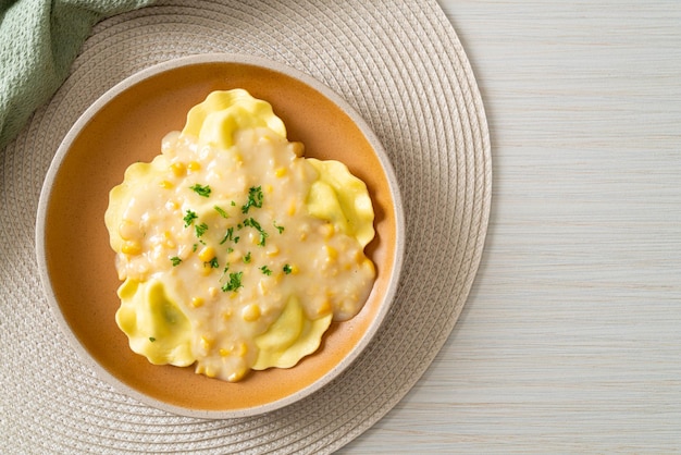 Ravioli pasta with corn cheese sauce