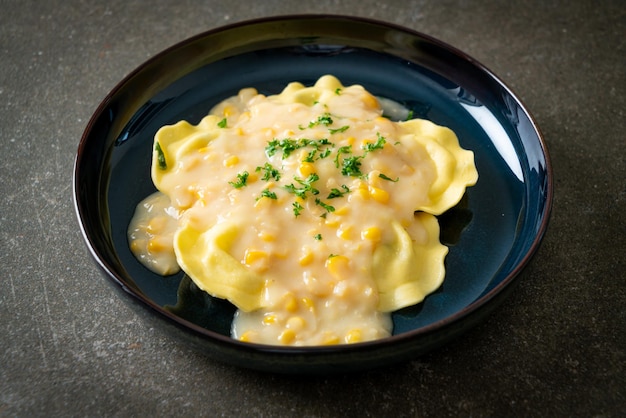 Ravioli pasta with corn cheese sauce