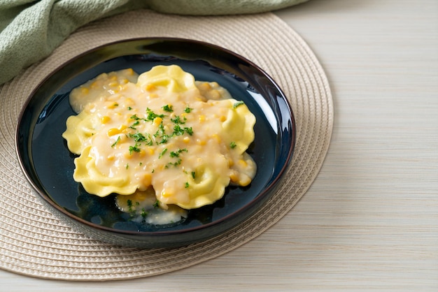 Ravioli pasta with corn cheese sauce