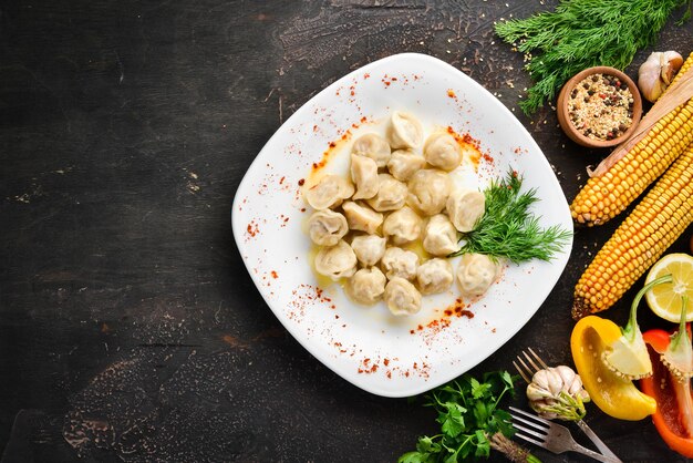 Ravioli with meat. Dumplings Top view. Free space for your text. Rustic style.