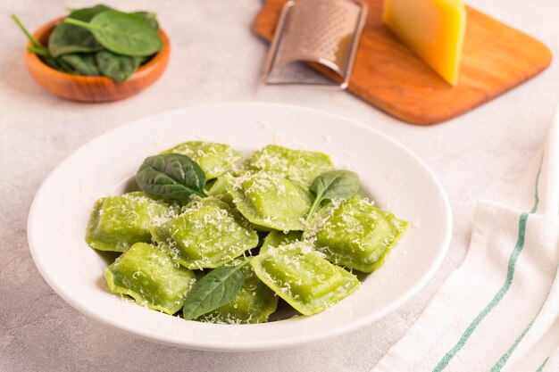 Ravioli with spinach and parmesan selective focus