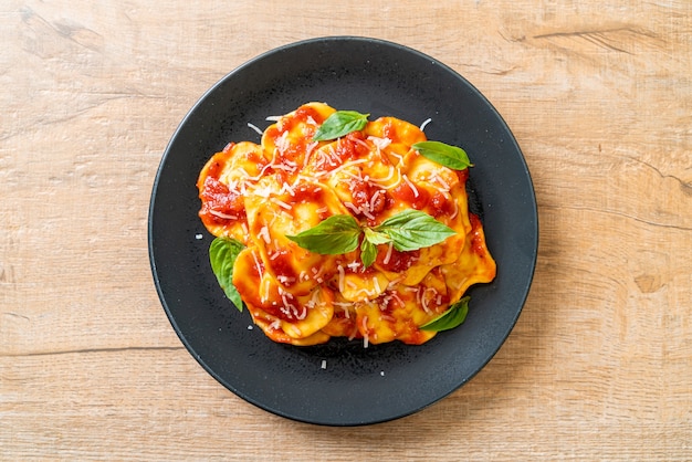 Ravioli with tomato sauce and basil - Italian food style