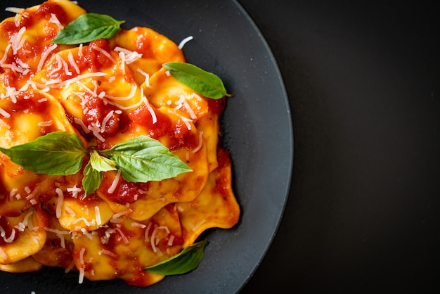 Ravioli with tomato sauce and basil - Italian food style