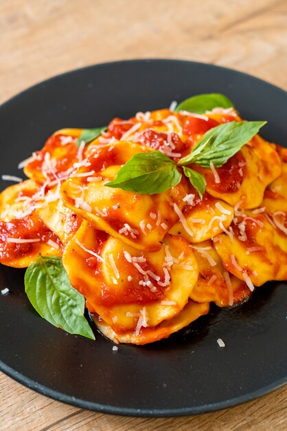 Ravioli with tomato sauce and basil