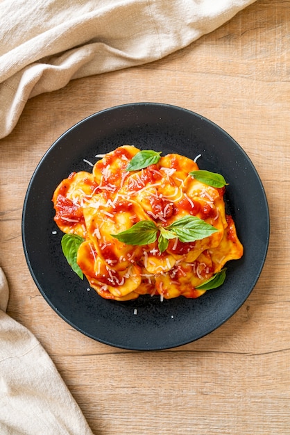 Ravioli with tomato sauce and basil