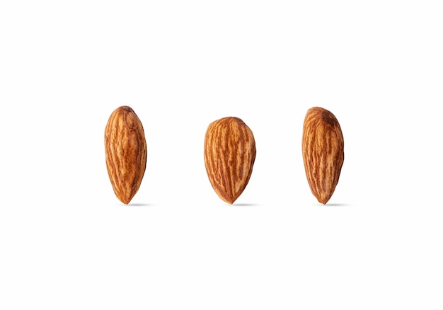 Raw almond isolated on white background