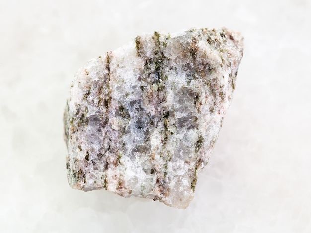 Raw Apatite ore of phosphorus stone on white