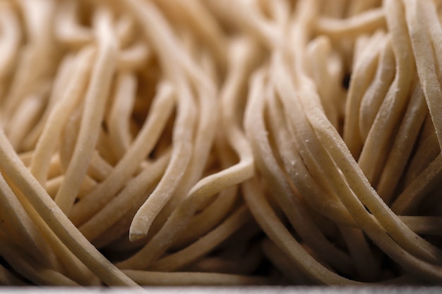 Raw Asian Ramen Noodle Texture, Egg Noodle or Mie Ayam