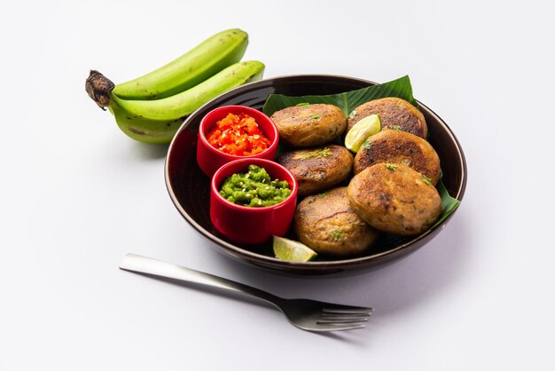 Raw Banana Cutlet also called plantain or kacche kele ki tikki or patties served with chutney