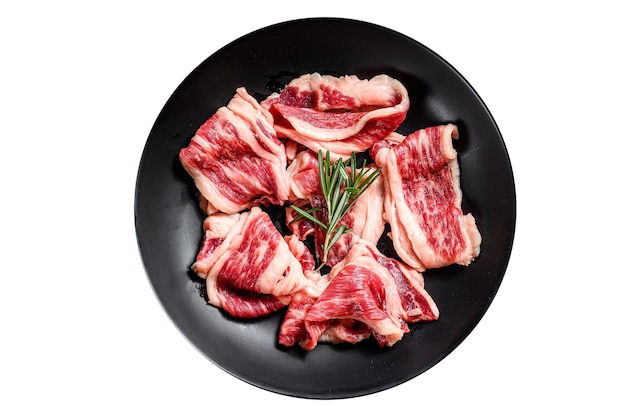 Raw beef bacon marbled meat in a plate Isolated on white background