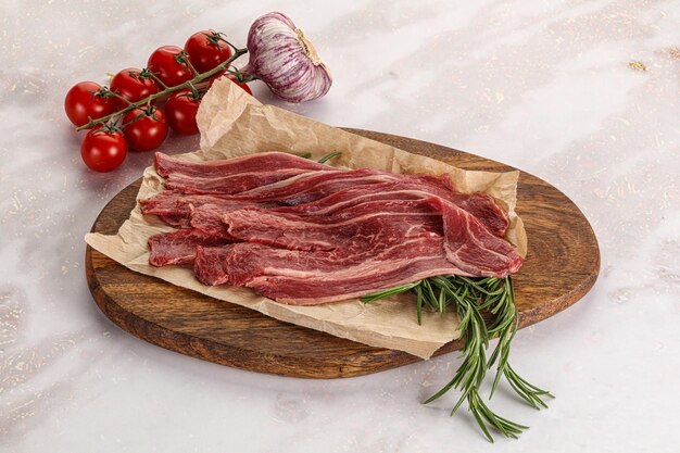 Raw beef bacon slices for cooking