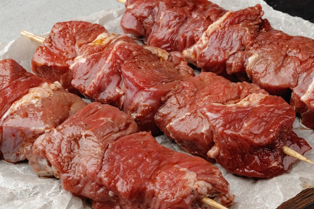 Raw beef kebab on skewers ready for barbecue