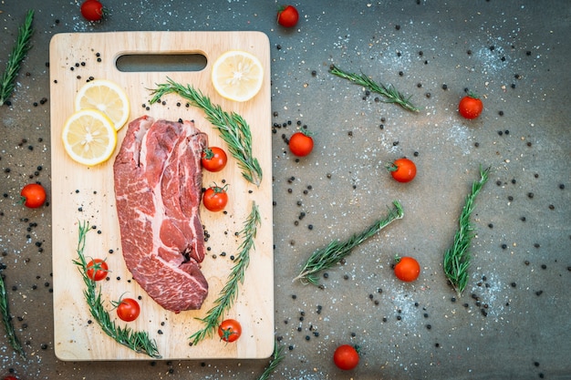 Raw beef meat on cutting board