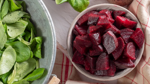 Raw beetroots with green salad