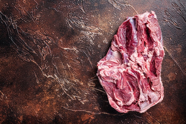 Raw Boneless Leg of Lamb meat on butcher table