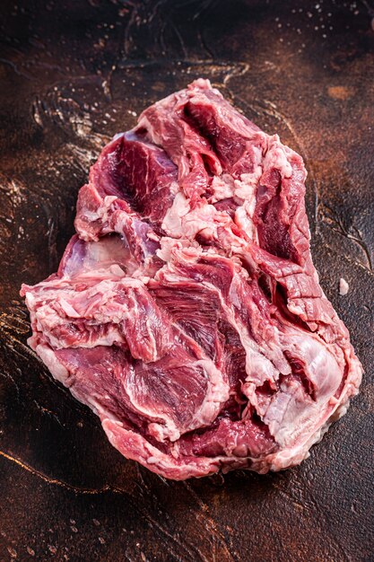 Raw Boneless Leg of Lamb meat on butcher table