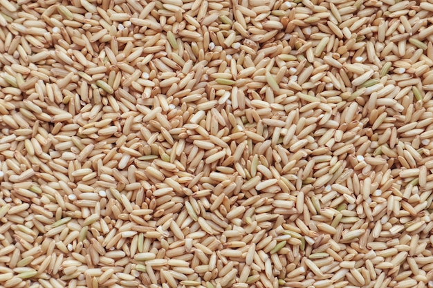 Raw brown rice. top view food background texture